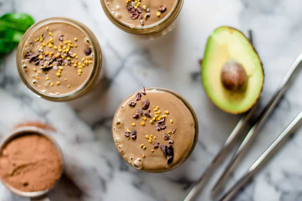 Closeup on the jars full of the Healthy Peanut Butter Chocolate Smoothie made for breakfast