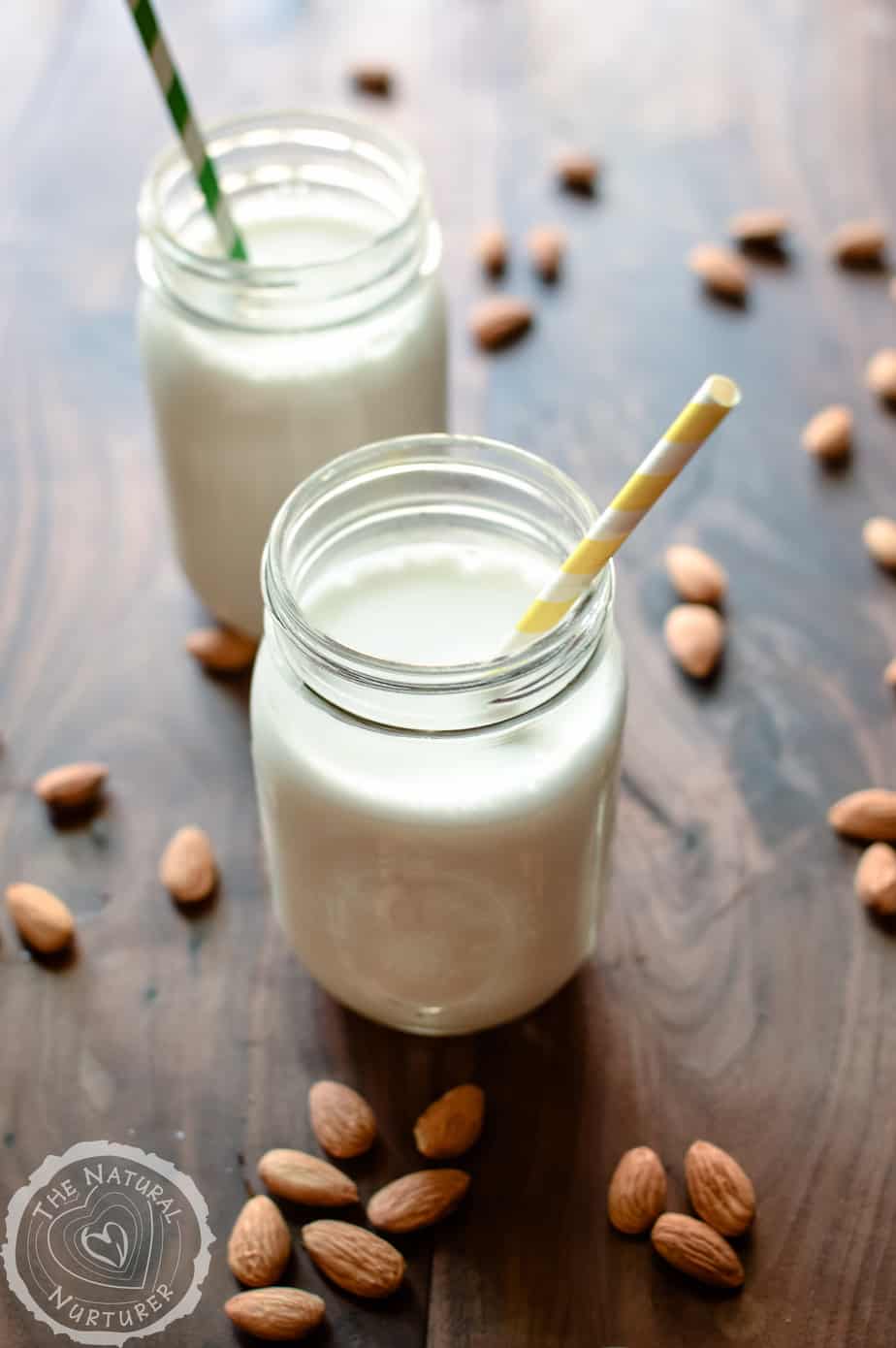 Ridiculously Easy Homemade Almond Milk served in two jars