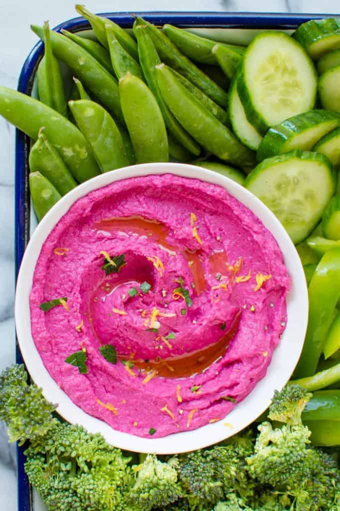 This is truly the BEST beet hummus under the sun and is so easy to make. Beautiful to look at, an amazing balance of flavors and a smooth, creamy texture to boot!