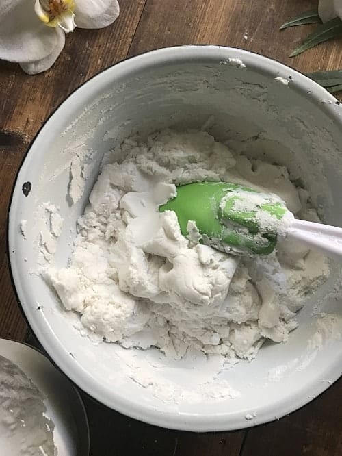 Snow dough mixed in a bowl with a spatula. 