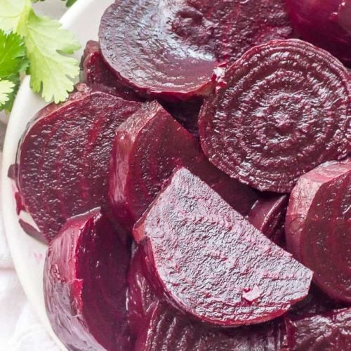 Roasted beets in a white bowl