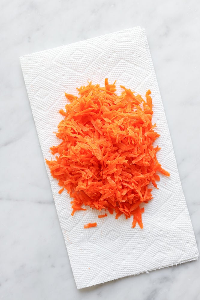 Grated carrots on a paper towel