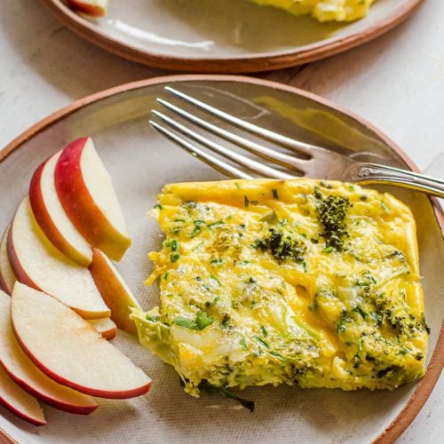 Cheesy Broccoli Egg Bake served with apples on the side