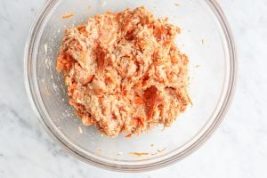Mixture for carrot chicken meatballs in a bowl before being formed into meatballs