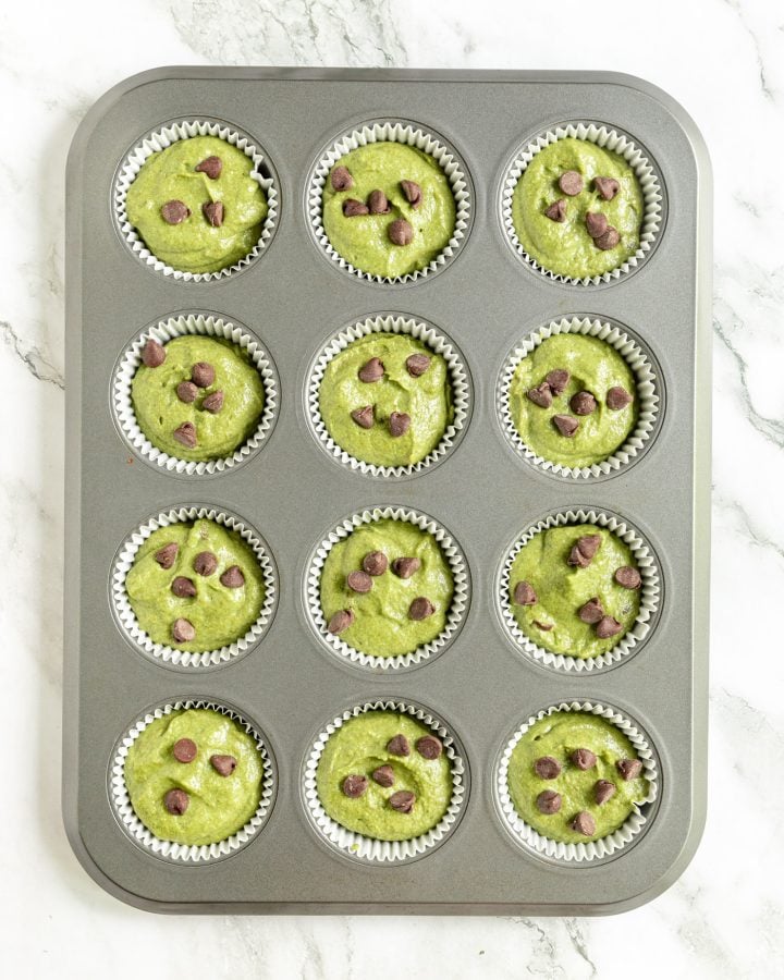 Sweet kale muffins in a muffin tin before baking