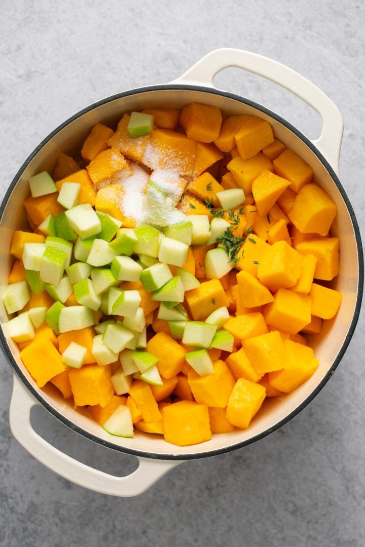 Diced butternut squash, chopped Granny Smith apples, salt and thyme in a Dutch oven