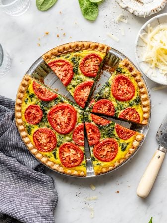 Vegetarian Tomato & Spinach Quiche with Cottage Cheese served.