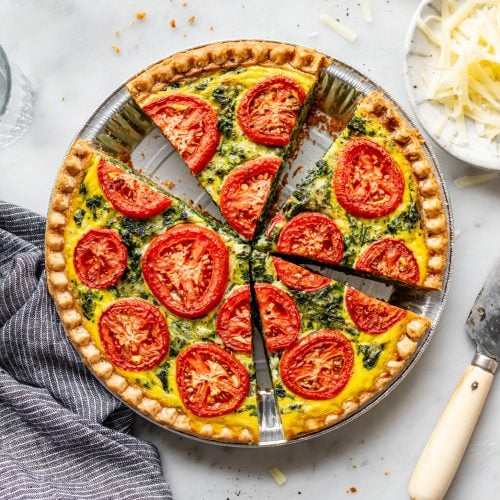 Vegetarian Tomato & Spinach Quiche with Cottage Cheese served.